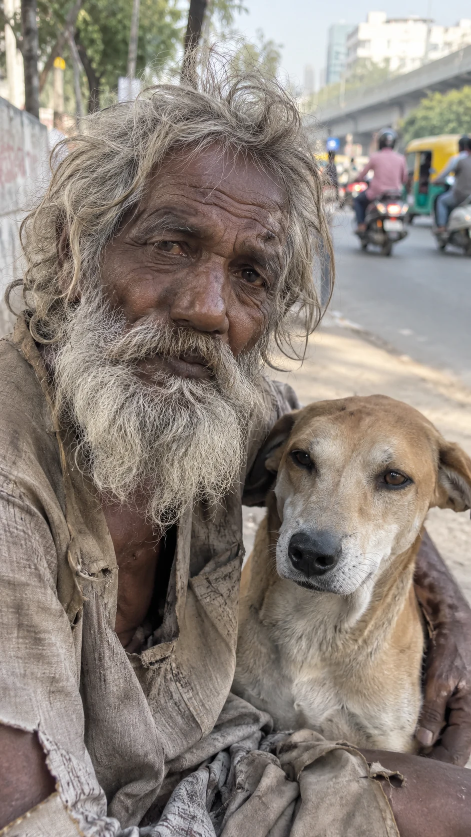 Reference photo 1: close-up of an elderly Indian man with long grey hair and beard holding a street dog